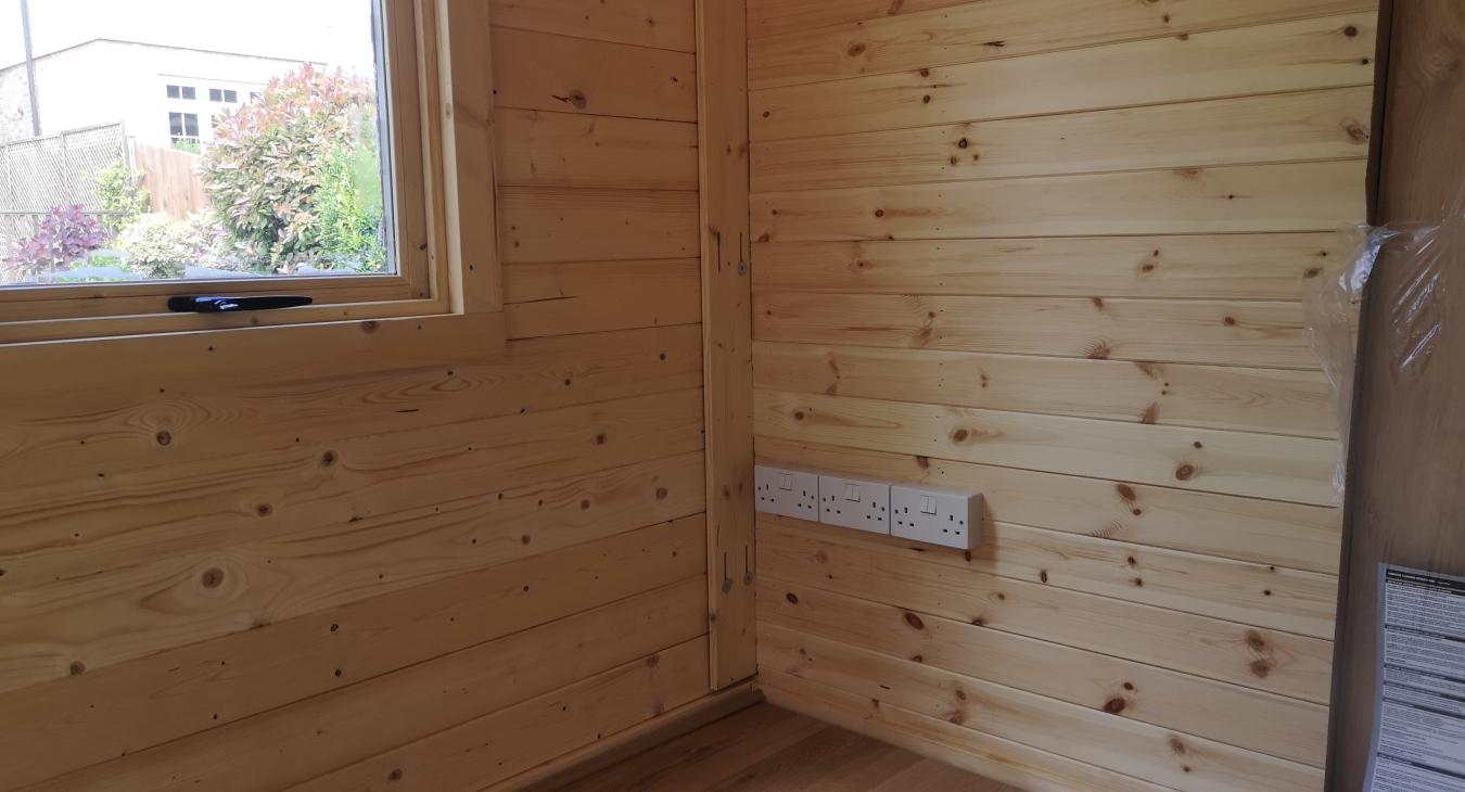 Seamless cable management with PVC conduit, ensuring a clutter-free and visually appealing interior in the summerhouse